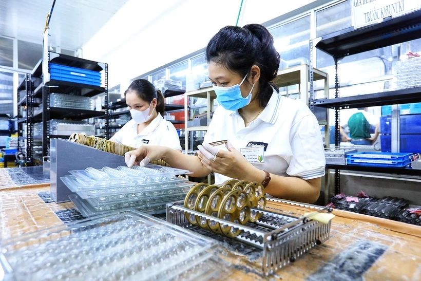 Tổng số vốn bổ sung vào nền kinh tế trong sáu tháng đầu đạt hơn 1,5 triệu tỷ đồng, giảm 7,7% so với cùng kỳ năm 2023. Ảnh: TTXVN.