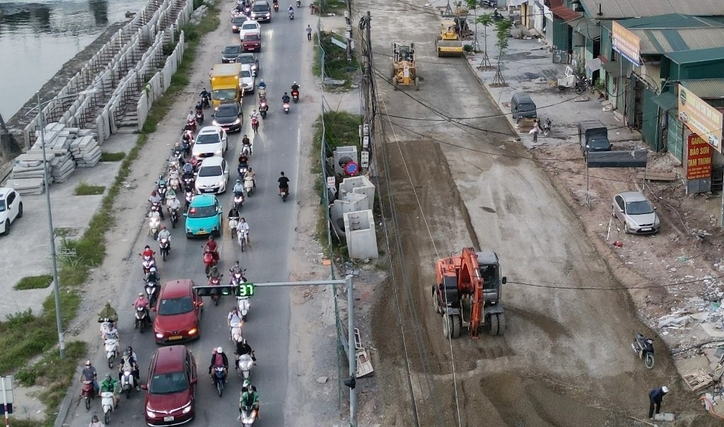 Đường cửa ngõ phía Nam Thủ đô sau 10 năm khởi công ‘lên đời’: Dự kiến hơn nửa năm nữa có mặt bằng sạch- Ảnh 1.