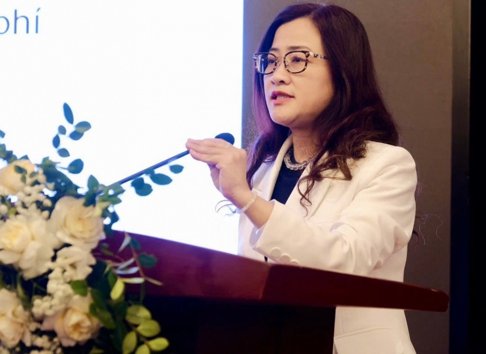 Vụ trưởng vụ BHYT Trần Thị Trang phát biểu. img-1238.jpg