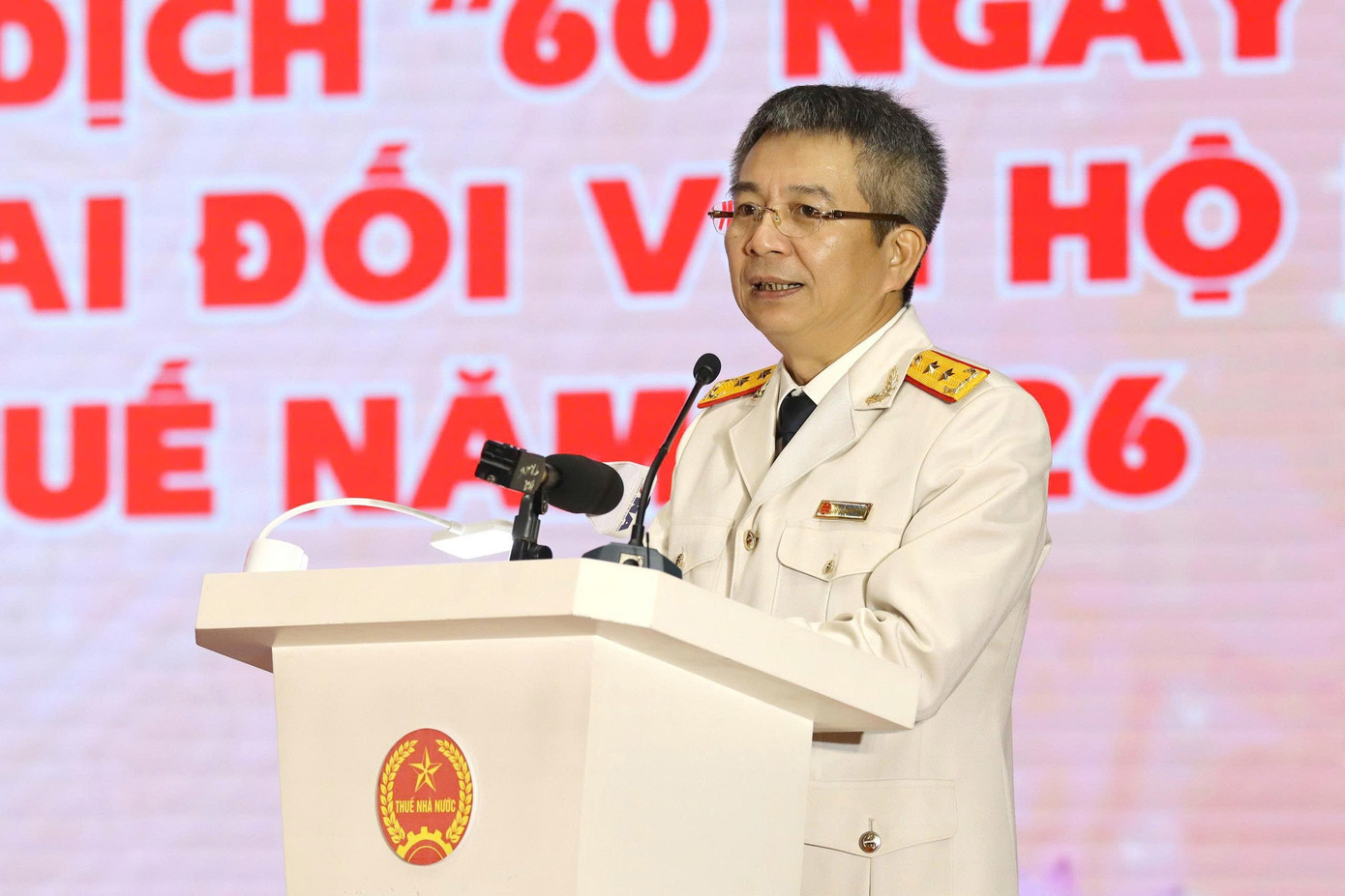 Cục trưởng Cục Thuế Mai Xuân Thành báo cáo tại hội nghị. 71dbfe9ca9b426ea7fa5.jpg