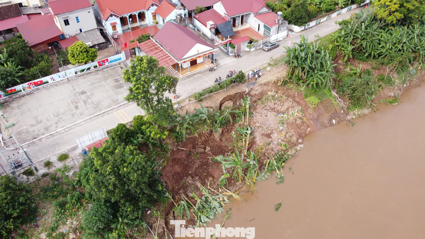 Sạt lở vào sát nhà dân. tp-6.jpg
