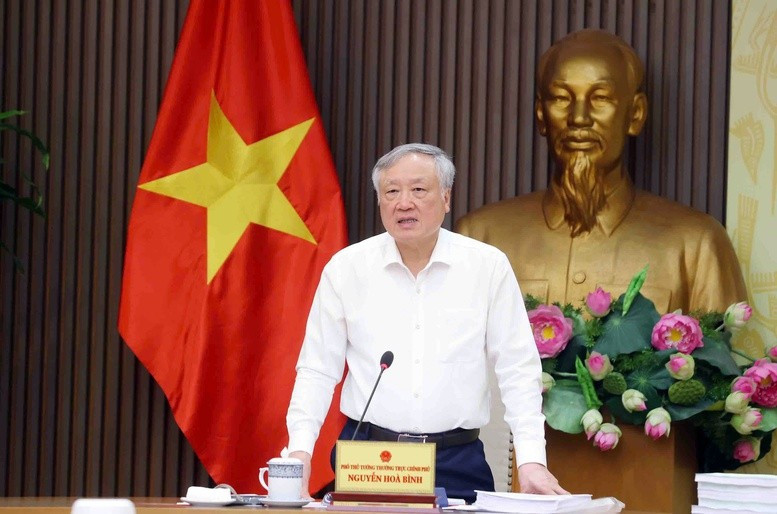 Phó Thủ tướng Thường trực Chính phủ Nguyễn Hòa Bình phát biểu tại cuộc họp. Ảnh: VGP. tienphong-258ptt.jpg