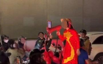 Xác minh video người phụ nữ cầm loa hô hào ‘Công an ngủ hết rồi, tí đi đua xe nhé’