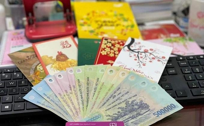 Tiền thưởng Tết được xác định là khoản thu nhập tính thuế thu nhập cá nhân. quyet-dinh-thuong-tet-002.jpg