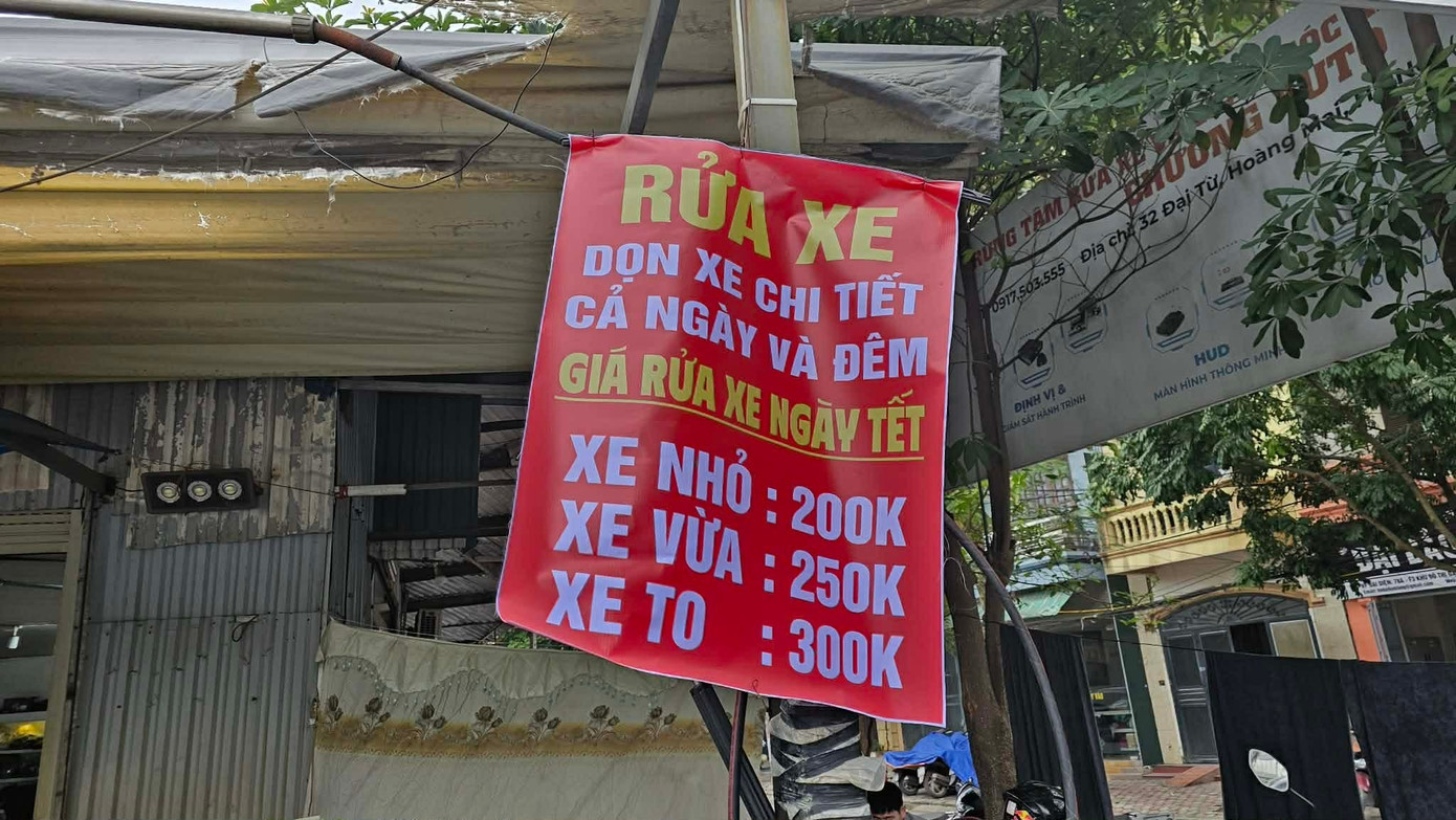 Một cửa hàng công khai báo giá dịch vụ rửa xe ngày Tết. rua-xe-tet-1.jpg