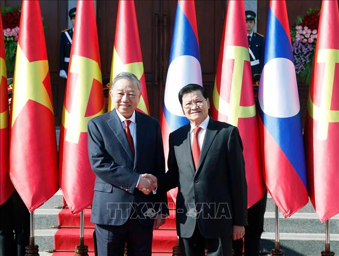 Lễ đón trọng thể Tổng Bí thư Tô Lâm tại thủ đô Viêng Chăn (Lào)- Ảnh 4. Lễ đón trọng thể Tổng Bí thư Tô Lâm tại thủ đô Viêng Chăn (Lào)- Ảnh 4.