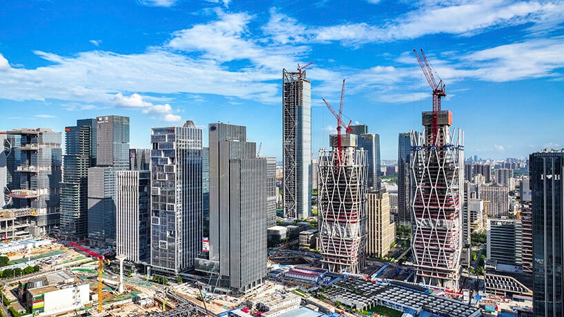 Tháp đôi văn phòng cao đến 200m sắp hoàn thiện: Quy mô hơn 170.000m2, kiến trúc ‘khoác’ lưới kim cương ấn tượng- Ảnh 1. Tháp đôi văn phòng cao đến 200m sắp hoàn thiện: Quy mô hơn 170.000m2, kiến trúc ‘khoác’ lưới kim cương ấn tượng- Ảnh 1.