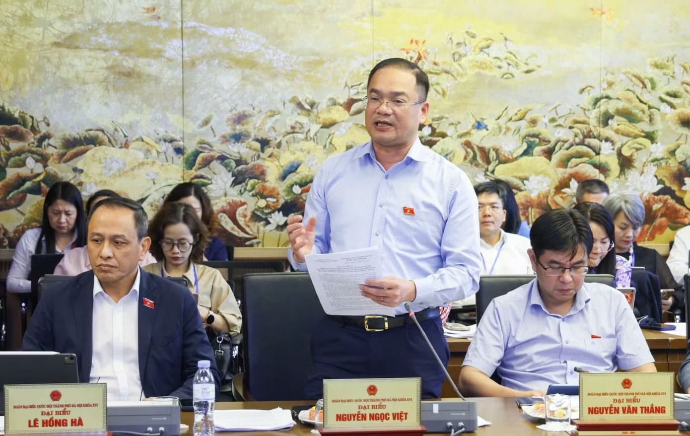 Đại biểu chuyên trách đoàn TP Hà Nội Nguyễn Ngọc Việt. Mua bán xe máy cũ không nên bắt buộc phải công chứng - Ảnh 3.