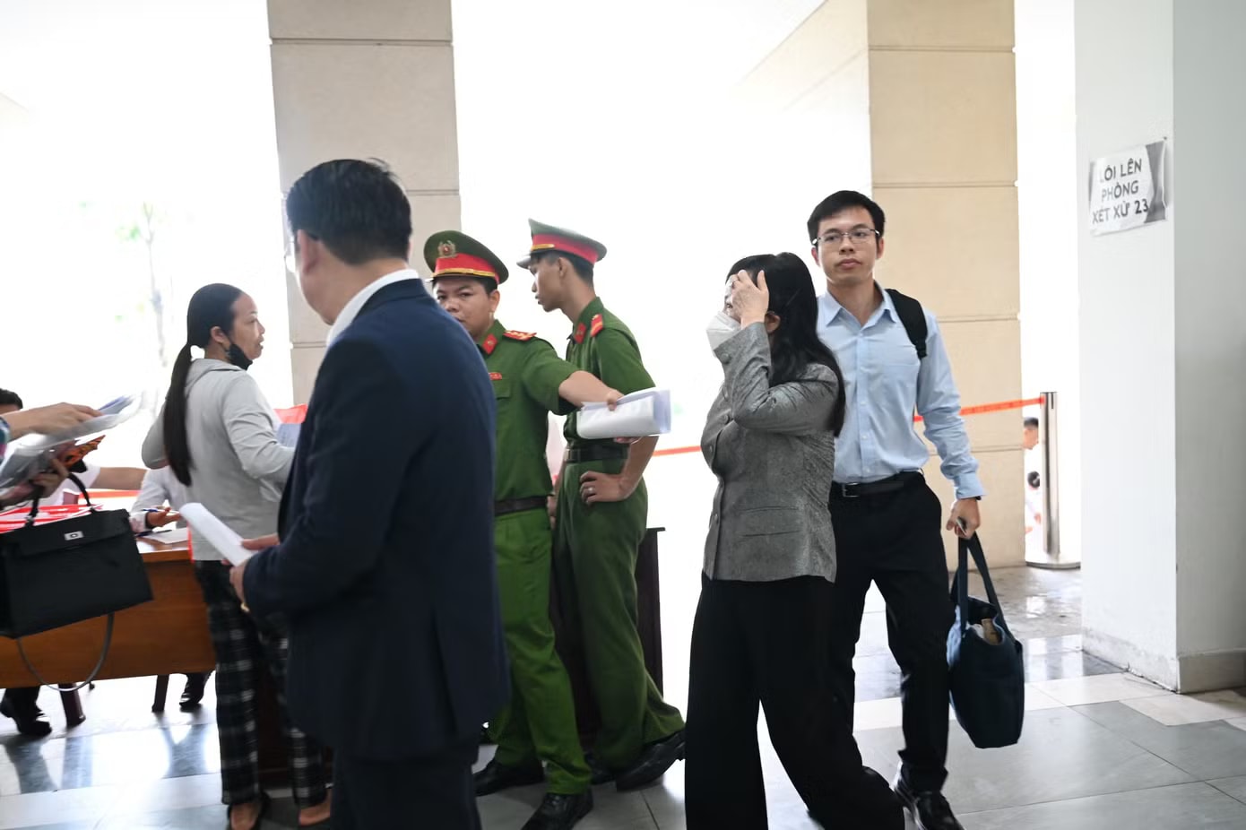 Hình ảnh cựu Bộ trưởng Nguyễn Thị Kim Tiến tại phiên tòa xét xử vụ sai phạm trong đầu tư cơ sở 2 BV Bạch Mai, Việt Đức - Ảnh 2.