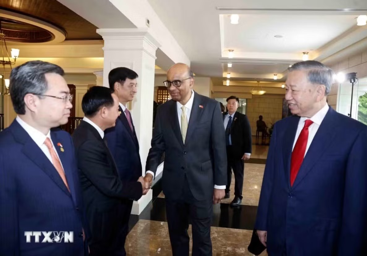 Lễ đón trọng thể Tổng Bí thư, Chủ tịch nước Tô Lâm và Phu nhân tại Singapore - Ảnh 6.