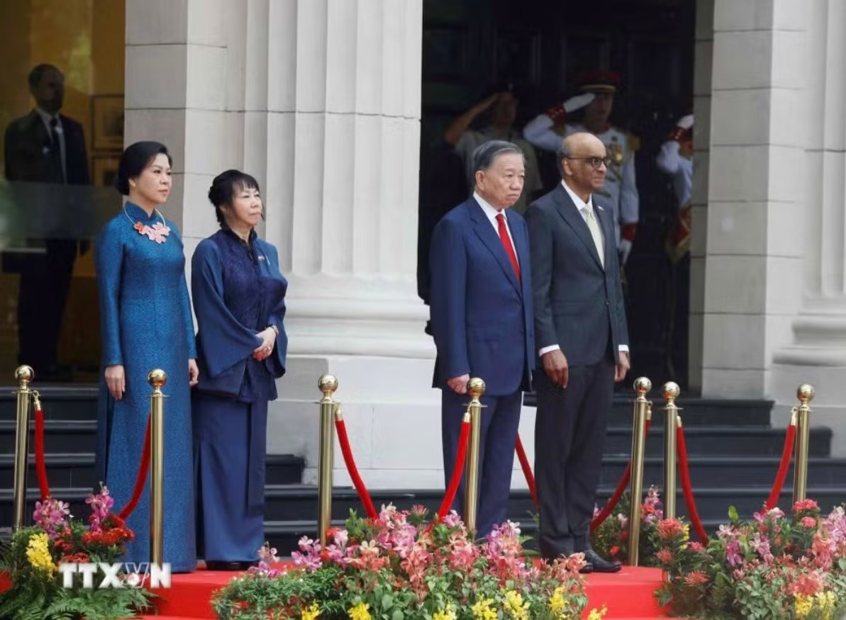 Lễ đón trọng thể Tổng Bí thư, Chủ tịch nước Tô Lâm và Phu nhân tại Singapore - Ảnh 3.