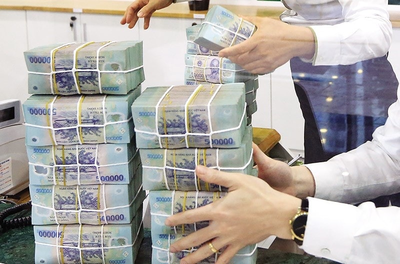 Ngân hàng Nhà nước yêu cầu các tổ chức tín dụng còn phải chủ động cân đối nguồn vốn và sử dụng vốn, bảo đảm thanh khoản và khả năng chi trả. (Ảnh minh họa)