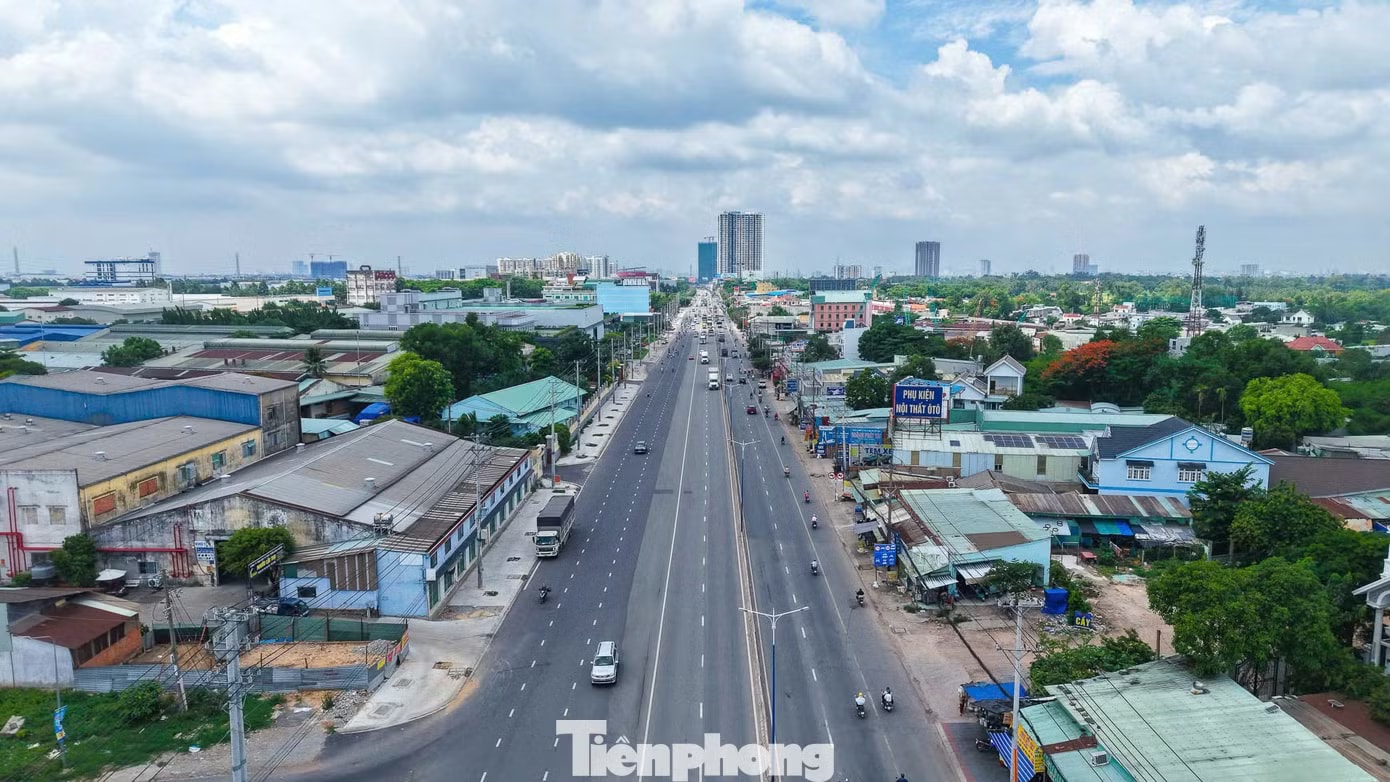 Hàng chục dự án căn hộ đua nhau 'mọc' lên dọc đoạn Quốc lộ - Ảnh 1.