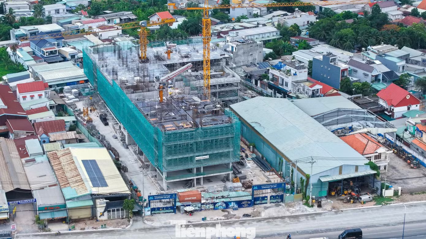 Hàng chục dự án căn hộ đua nhau 'mọc' lên dọc đoạn Quốc lộ - Ảnh 14.