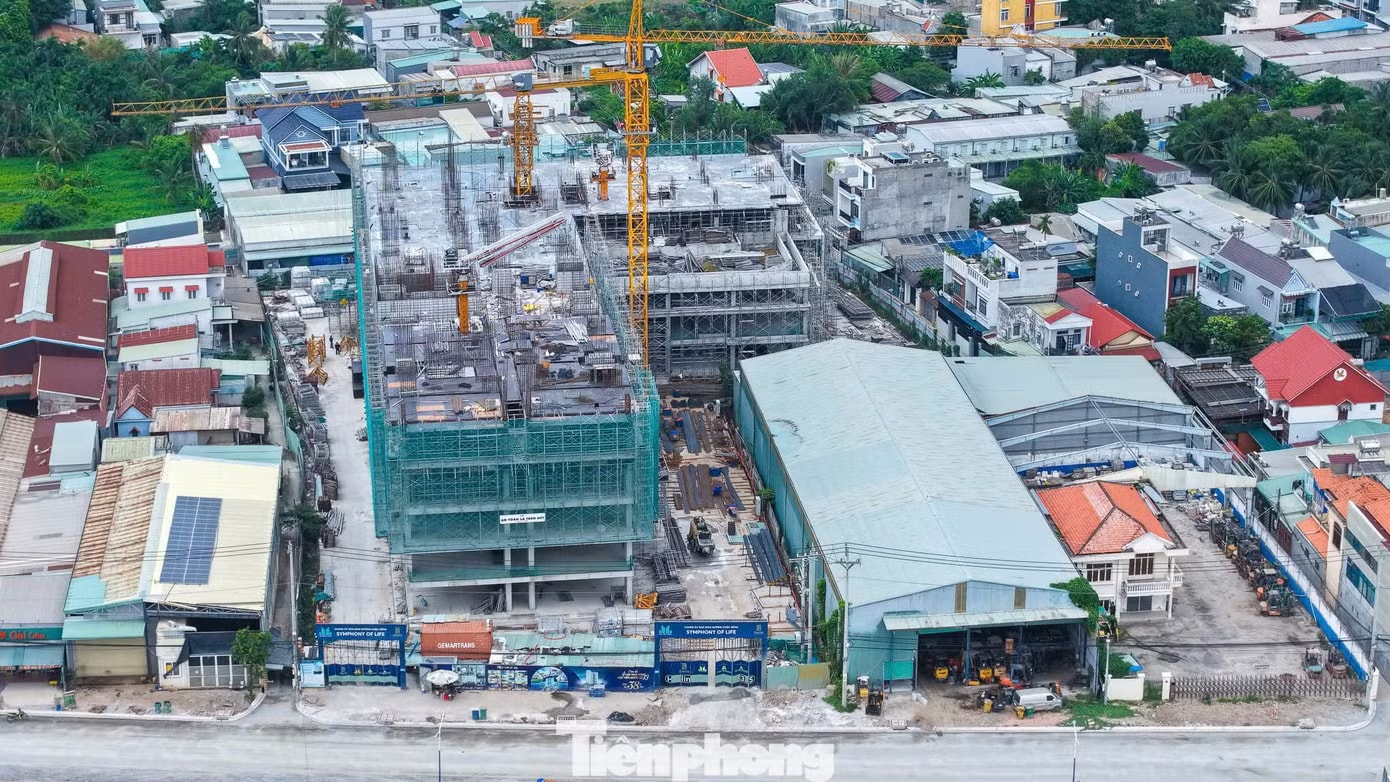 Hàng chục dự án căn hộ đua nhau 'mọc' lên dọc đoạn Quốc lộ - Ảnh 15.