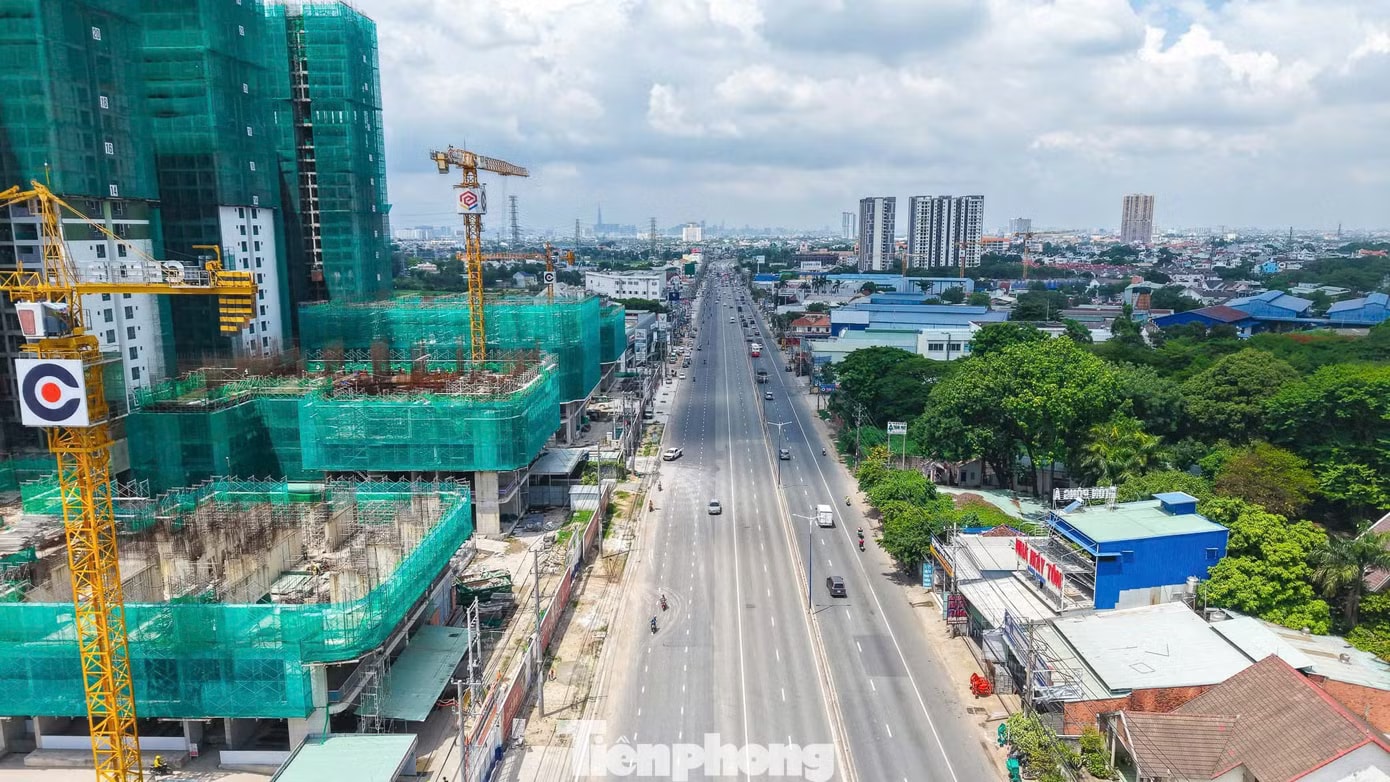 Hàng chục dự án căn hộ đua nhau 'mọc' lên dọc đoạn Quốc lộ - Ảnh 3.
