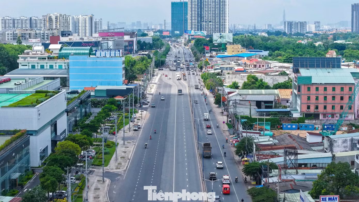 Hàng chục dự án căn hộ đua nhau 'mọc' lên dọc đoạn Quốc lộ - Ảnh 2.
