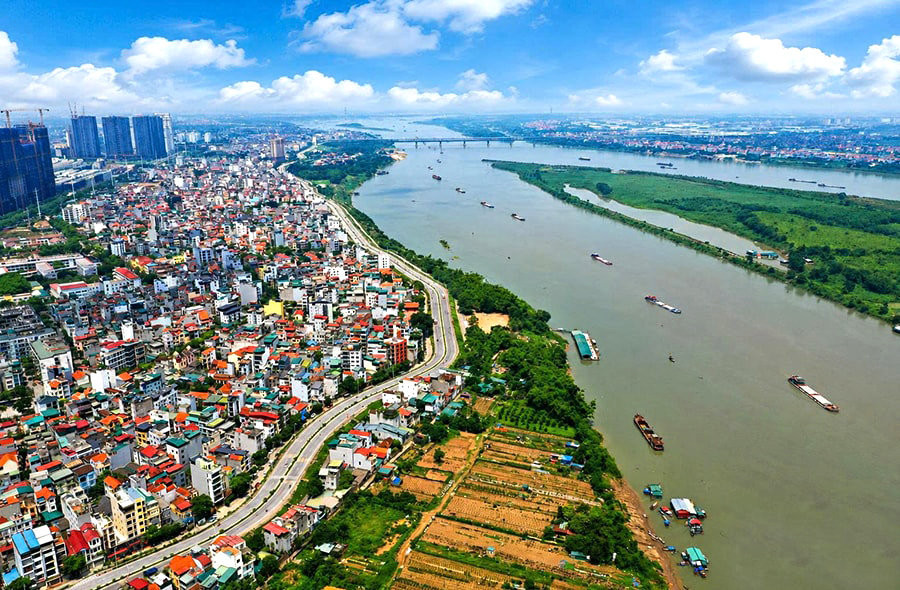 Di dời gần 250.000 người dân làm đại lộ sông Hồng 736.000 tỷ: Chuyên gia nói cuộc chơi bất động sản Hà Nội sẽ thay đổi - Ảnh 1.
