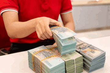Tiền mặt lưu thông giảm còn gần 2,1 triệu tỷ đồng, nguồn vốn huy động chưa theo kịp đà tăng tín dụng