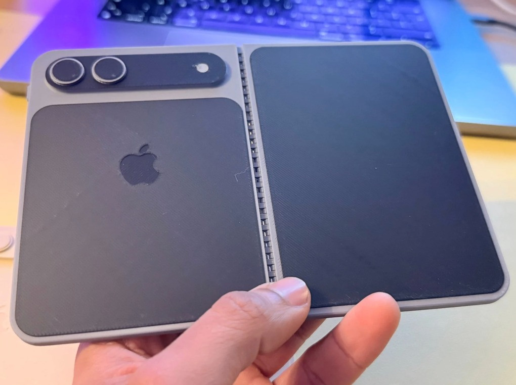 Apple lộ kế hoạch 'tất tay' với iPhone gập, sẵn sàng 'đại chiến' Samsung? - Ảnh 1.