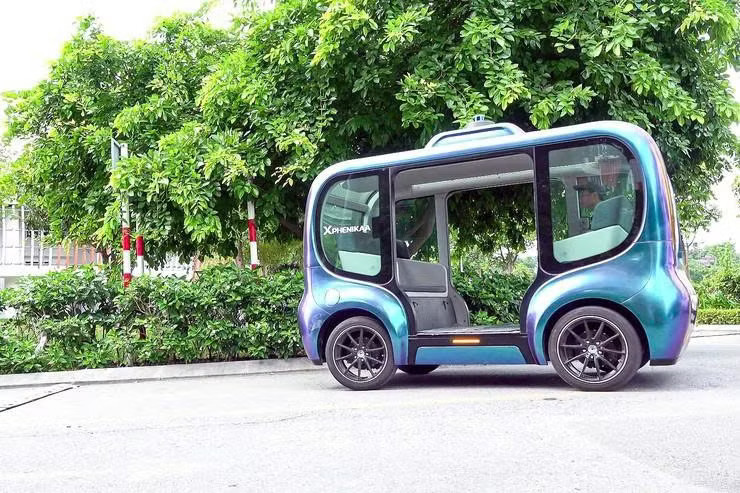 Hà Nội thử nghiệm hệ thống giao thông tự hành thông minh bao gồm: Xe buýt, robotaxi, robot dọn vệ sinh tự động, robot giao hàng. Ảnh: Phenikaa-X Hà Nội thử nghiệm xe buýt tự hành, robot giao hàng tự động - Ảnh 1.