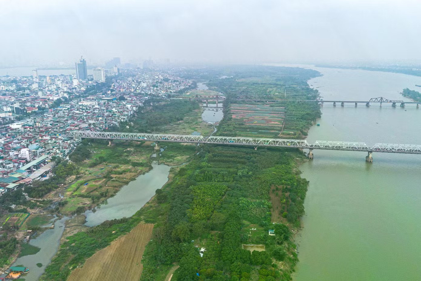 Đồ án điều chỉnh quy hoạch phân khu đô thị sông Hồng dự kiến quy mô dân số khu vực tối đa 1,2 triệu người. Ảnh: Đinh Hà. Chi tiết Quy hoạch phân khu đô thị sông Hồng sau điều chỉnh - Ảnh 3.